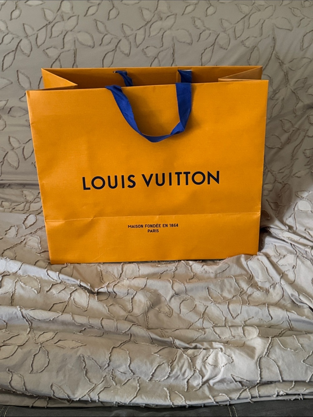 Louis Vuitton Orange Bag with Blue Ribbon Handles
